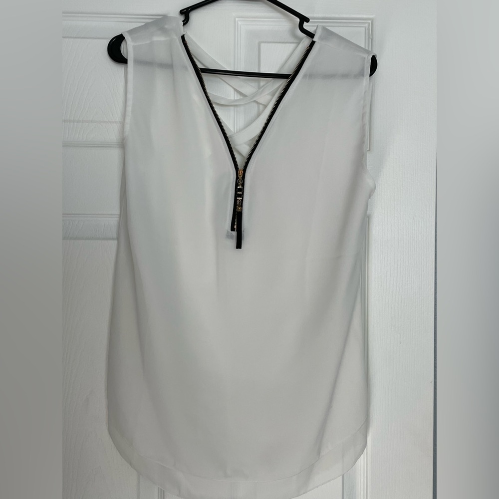 Sheerlike women’s top, vip detail